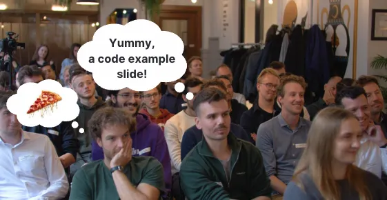 Audience watching a technical presentation